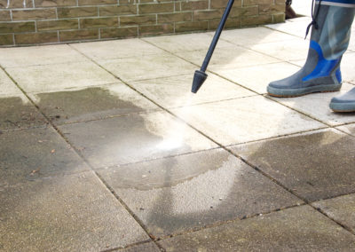 Outdoor floor cleaning with high pressure water jet